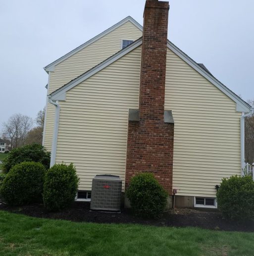 beige home after cleaning with brick chimney